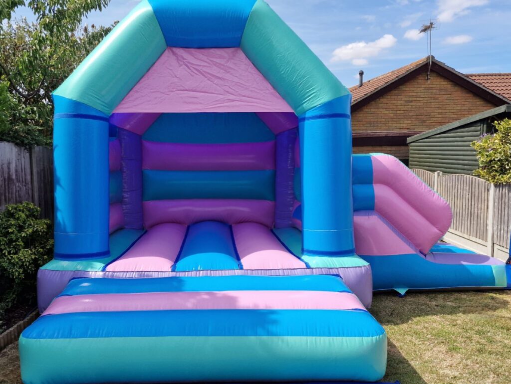 Multi Coloured Pastel Castle With Slide Jolly Kids Castles